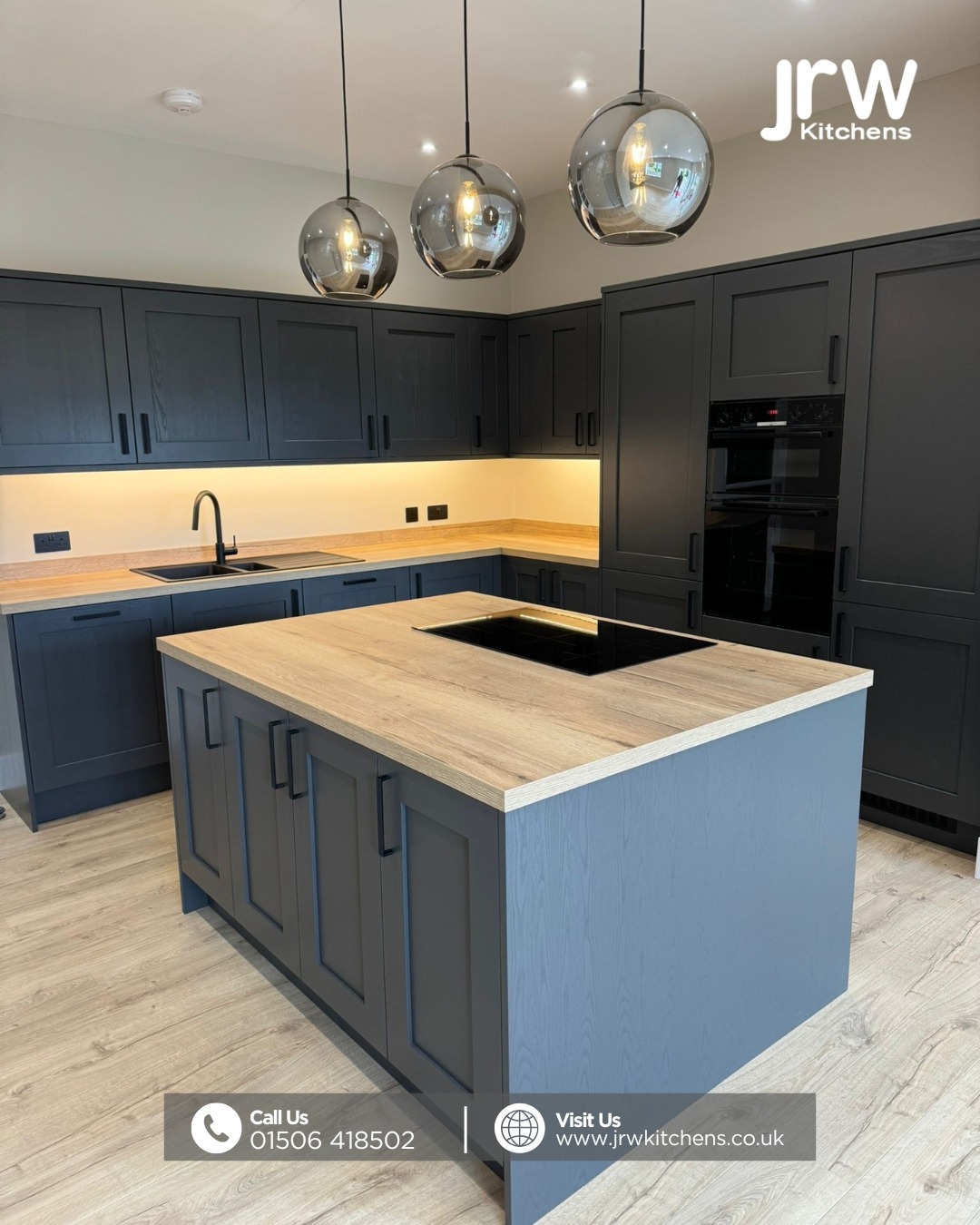 Contemporary two-tone bespoke kitchen with custom cabinetry, refined colour contrast, and sophisticated design details.